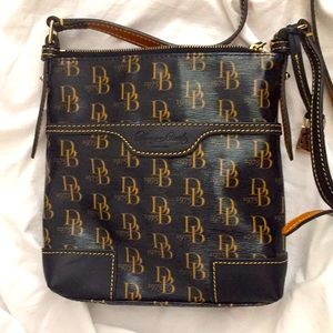 Black crossbody bag by Dooney Bourke